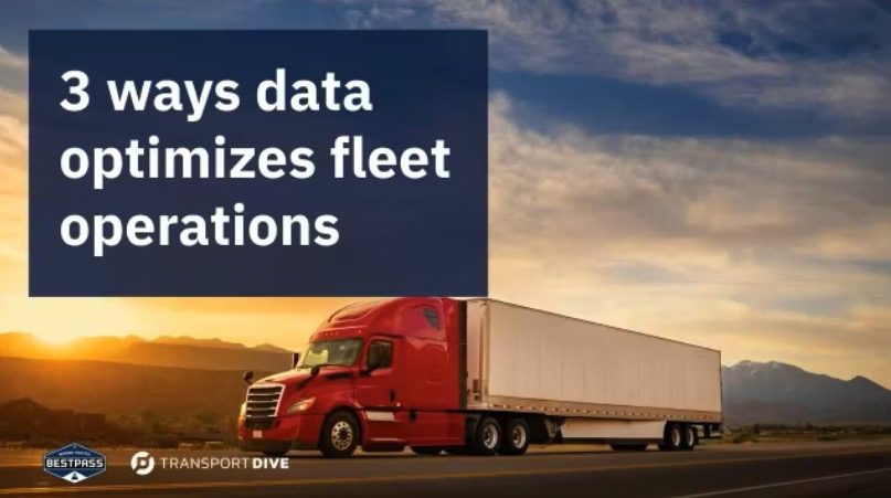 A large red truck on a highway at sunset, representing fleet management data optimization.