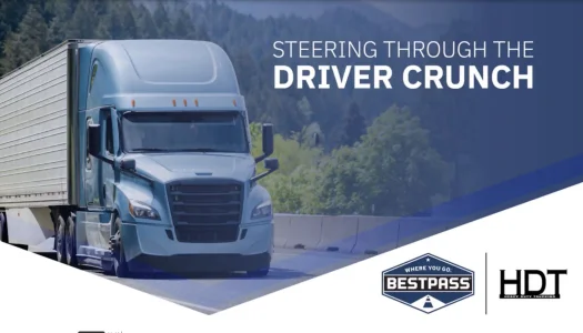 A truck traveling on a highway with text "Steering Through the Driver Crunch.